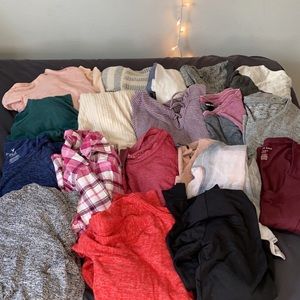 Various sweaters and long sleeved tshirts.